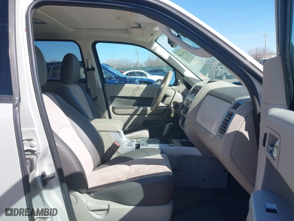 2009 Mercury Mariner Premier with VIN 4M2CU87G69KJ11232, listed as a IAAI auction lot 41761605 with 63,239 mi miles. Bid and sale history available at carsss.com. Image 5.