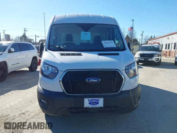 2022 Ford Transit Cargo z VIN 1FTBR2CG0NKA17606, wystawiony jako IAAI lot #41061434 z przebiegiem 64 062 mil mil oraz . Historia ofert i sprzedaży dostępna na DreamBid. Obrazek 12.