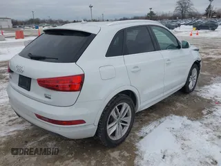 2017 Audi Q3 Premium Plus z VIN WA1JCCFS6HR008921, wystawiony jako IAAI lot #41351675 z przebiegiem 117 158 mil mil oraz . Historia ofert i sprzedaży dostępna na DreamBid. Obrazek 4.