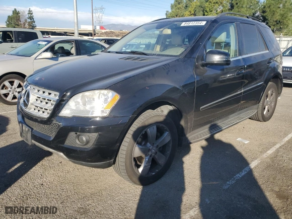 2011 Mercedes-Benz M-Class ML 350 with VIN 4JGBB8GB7BA642121, listed as a Copart auction lot 84812354 with 254,992 mi miles and Salvage Title. Bid and sale history available at carsss.com. Image 1.