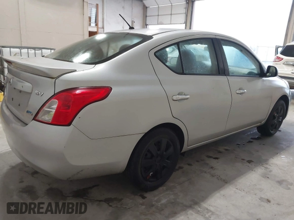 2014 Nissan Versa SV with VIN 3N1CN7AP4EK440552, listed as a IAAI auction lot 41099015 with 97,074 mi miles. Bid and sale history available at carsss.com. Image 4.