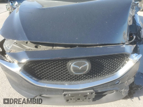2019 Mazda CX-5 Signature with VIN JM3KFBEY9K0644365, listed as a Copart auction lot 50019225 with 42,708 mi miles and Salvage Title. Bid and sale history available at carsss.com. Image 12.