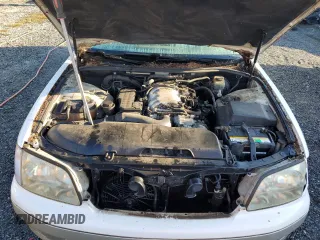 2000 Lexus LS 400 z VIN JT8BH28F0Y0175297, wystawiony jako Copart lot #75230834 z przebiegiem 293 851 mil mil oraz Szkoda całkowita • Salvage title. Historia ofert i sprzedaży dostępna na DreamBid. Obrazek 11.