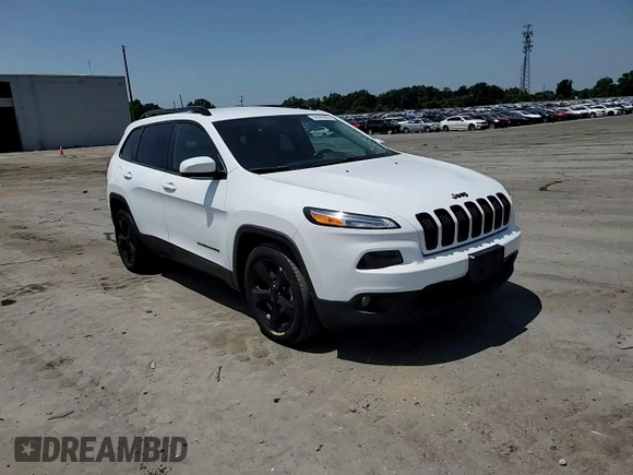 2016 Jeep Cherokee Altitude with VIN 1C4PJLCB8GW207480, listed as a Copart auction lot 62026585 with 124,229 mi miles and Salvage title. Bid and sale history available at DreamBid. Image 14.