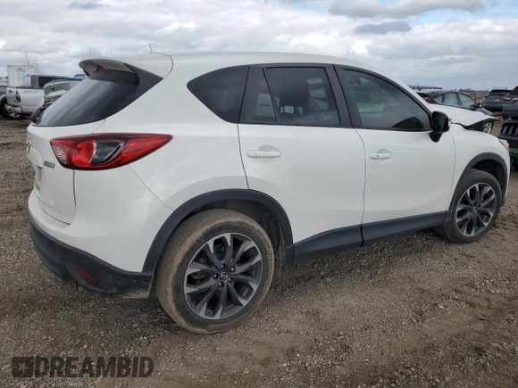 2016 Mazda CX-5 Grand Touring with VIN JM3KE2DYXG0784971, listed as a Copart auction lot 43865605 with 146,025 mi miles and Salvage Title. Bid and sale history available at carsss.com. Image 3.