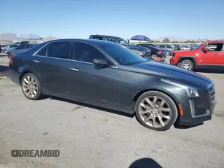 2014 Cadillac CTS Premium AWD with VIN 1G6AZ5S34E0123356, listed as a Copart auction lot 69327504 with 136,292 mi miles and Salvage Title. Bid and sale history available at DreamBid. Image 4.
