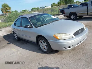 2006 Ford Taurus SE z VIN 1FAFP53U36A134589, wystawiony jako IAAI lot #42666444 z przebiegiem 100 666 mil mil oraz . Historia ofert i sprzedaży dostępna na DreamBid. Obrazek 1.