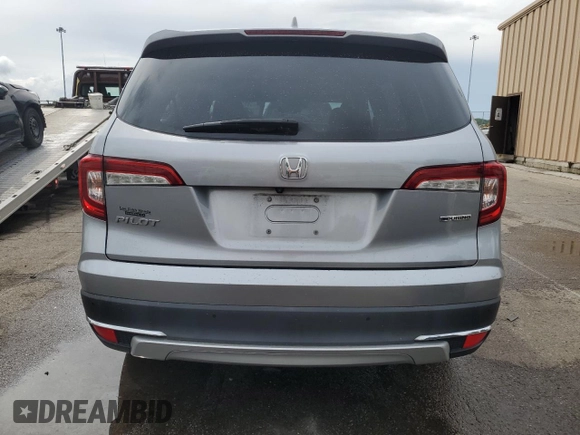 2019 Honda Pilot Touring 8-Passenger z VIN 5FNYF5H91KB033661, wystawiony jako Copart lot #56650155 z przebiegiem 73 512 mil mil oraz Szkoda całkowita • Salvage title. Historia ofert i sprzedaży dostępna na DreamBid. Obrazek 6.