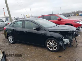 2016 Ford Focus SE z VIN 1FADP3F25GL386582, wystawiony jako IAAI lot #41097395 z przebiegiem 101 479 mil mil oraz . Historia ofert i sprzedaży dostępna na DreamBid. Obrazek 14.