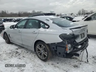 2015 BMW 4 Series 435i xDrive with VIN WBA4B3C51FD670241, listed as a Copart auction lot 41464845 with 81,780 mi miles and Salvage Title. Bid and sale history available at DreamBid. Image 2.