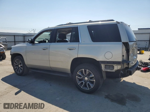 2016 Chevrolet Tahoe LS with VIN 1GNSCAKC7GR465949, listed as a Copart auction lot 50030625 with 136,608 mi miles and Salvage title. Bid and sale history available at DreamBid. Image 2.