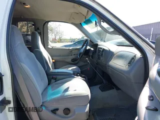 1998 Ford F-150 XL with VIN 1FTZX072XWKA12003, listed as a IAAI auction lot 41765328 with 119,445 mi miles and . Bid and sale history available at DreamBid. Image 5.