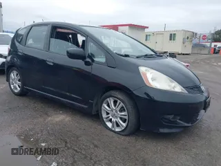 2009 Honda Fit Sport z VIN JHMGE88449S063396, wystawiony jako IAAI lot #41773616 z przebiegiem 72 582 mil mil oraz . Historia ofert i sprzedaży dostępna na DreamBid. Obrazek 1.