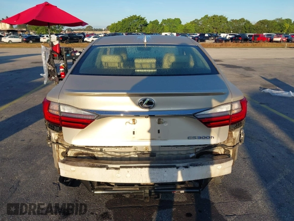 2016 Lexus ES 300h z VIN JTHBW1GG4G2106710, wystawiony jako IAAI lot #41684479 z przebiegiem 144 559 mil mil oraz . Historia ofert i sprzedaży dostępna na DreamBid. Obrazek 17.
