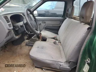 1998 Nissan Frontier XE with VIN 1N6DD21S8WC303274, listed as a Copart auction lot 79755584 with Not provided miles and Salvage title. Bid and sale history available at DreamBid. Image 7.