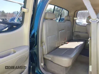 2000 Toyota Tundra Limited with VIN 5TBBT4815YS065867, listed as a IAAI auction lot 41995501 with 208,889 mi miles. Bid and sale history available at carsss.com. Image 8.
