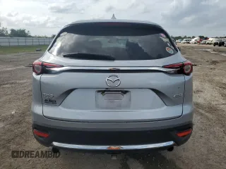 2016 Mazda CX-9 Signature with VIN JM3TCBEY1G0121667, listed as a Copart auction lot 54974805 with Not provided miles and Salvage title. Bid and sale history available at DreamBid. Image 6.