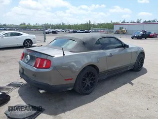 2010 Ford Mustang V6 with VIN 1ZVBP8EN1A5178265, listed as a IAAI auction lot 42107186 with 143,556 mi miles. Bid and sale history available at carsss.com. Image 4.