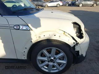 2013 MINI Hardtop S with VIN WMWSV3C53DT479714, listed as a IAAI auction lot 41685283 with 61,904 mi miles and . Bid and sale history available at DreamBid. Image 12.