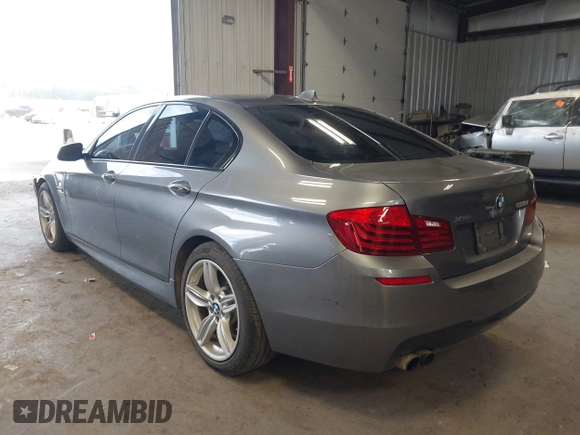 2014 BMW 5 Series 528i xDrive with VIN WBA5A7C5XED613856, listed as a IAAI auction lot 42018901 with 121,783 mi miles and . Bid and sale history available at DreamBid. Image 3.