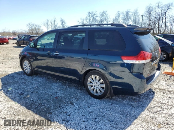2011 Toyota Sienna XLE AAS with VIN 5TDYK3DC6BS170205, listed as a Copart auction lot 50868135 with 153,134 mi miles and Salvage Title. Bid and sale history available at DreamBid. Image 2.