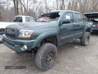 2011 Toyota Tacoma with VIN 5TFLU4EN0BX021583, listed as a IAAI auction lot 41937302 with 249,251 mi miles. Bid and sale history available at carsss.com. Image 2.