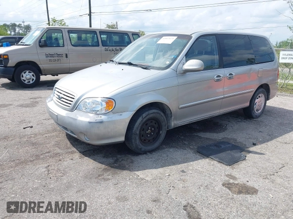 2003 Kia Sedona LX with VIN KNDUP131236417368, listed as a IAAI auction lot 41863624 with 142,896 mi miles. Bid and sale history available at carsss.com. Image 2.