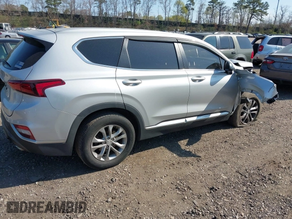 2019 Hyundai Santa Fe SE with VIN 5NMS23AD3KH102739, listed as a IAAI auction lot 42097252 with 116,023 mi miles and . Bid and sale history available at DreamBid. Image 4.