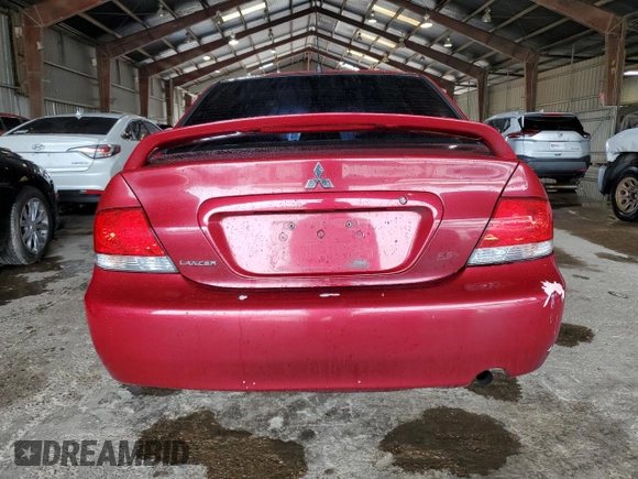 2004 Mitsubishi Lancer ES with VIN JA3AJ26E04U011285, listed as a Copart auction lot 76824724 with 196,334 mi miles and Salvage Title. Bid and sale history available at carsss.com. Image 6.