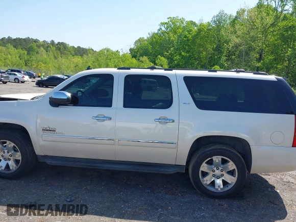 2013 GMC Yukon XL SLT with VIN 1GKS1KE00DR356030, listed as a IAAI auction lot 41969667 with 184,272 mi miles. Bid and sale history available at carsss.com. Image 14.
