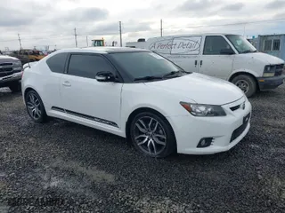 2013 Scion tC with VIN JTKJF5C70D3065601, listed as a IAAI auction lot 41272881 with 110,828 mi miles. Bid and sale history available at carsss.com. Image 1.