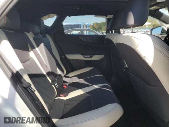2023 Lexus NX 350h Luxury with VIN JTJHKCEZ7P2013703, listed as a Copart auction lot 74935304 with 22,069 mi miles and Salvage Title. Bid and sale history available at DreamBid. Image 11.