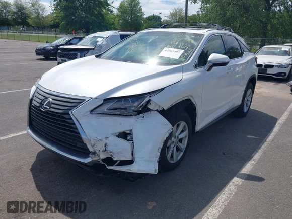 2016 Lexus RX 350 z VIN 2T2BZMCA1GC018531, wystawiony jako IAAI lot #42267497 z przebiegiem 182 473 mil mil oraz . Historia ofert i sprzedaży dostępna na DreamBid. Obrazek 2.