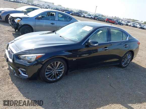 2019 Infiniti Q50 Luxe with VIN JN1EV7AP8KM543395, listed as a IAAI auction lot 42418112 with 43,382 mi miles and . Bid and sale history available at DreamBid. Image 14.