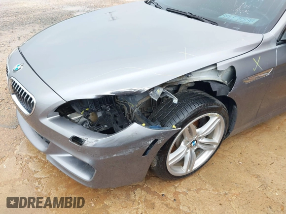 2016 BMW 6 Series 640i xDrive with VIN WBA6D2C58GGT66160, listed as a IAAI auction lot 41130666 with 102,064 mi miles and . Bid and sale history available at carsss.com. Image 6.