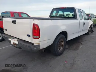 2004 Ford F-150 XL with VIN 2FTRX17W84CA43289, listed as a IAAI auction lot 41248462 with Not provided miles and . Bid and sale history available at DreamBid. Image 4.