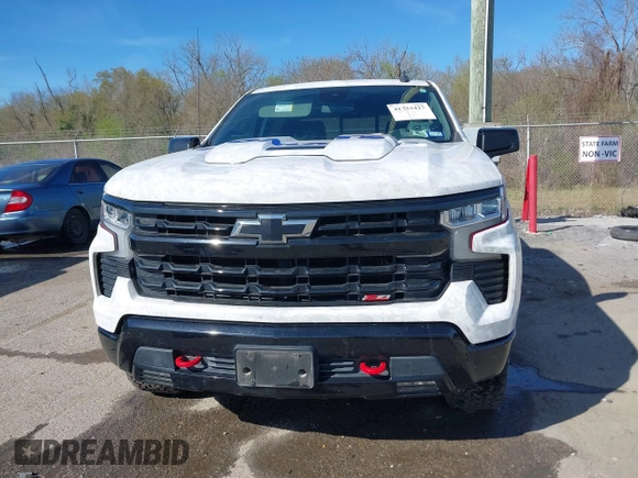 2023 Chevrolet Silverado 1500 LT Trail Boss with VIN 3GCUDFED3PG197885, listed as a IAAI auction lot 41733427 with 64,911 mi miles and . Bid and sale history available at DreamBid. Image 12.