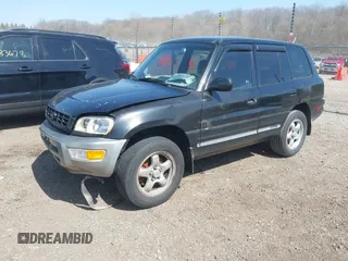 1999 Toyota RAV4 with VIN JT3GP10V9X7058089, listed as a IAAI auction lot 42040497 with 189,779 mi miles and . Bid and sale history available at DreamBid. Image 2.