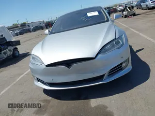 2013 Tesla Model S with VIN 5YJSA1CN5DFP11381, listed as a IAAI auction lot 42087803 with 146,818 mi miles and . Bid and sale history available at DreamBid. Image 11.