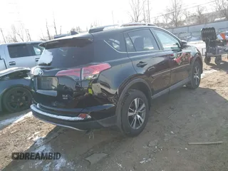 2018 Toyota RAV4 XLE with VIN 2T3RFREV1JW808773, listed as a IAAI auction lot 41595377 with 109,309 mi miles. Bid and sale history available at carsss.com. Image 4.