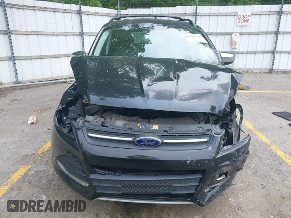 2013 Ford Escape SE with VIN 1FMCU0GX0DUC64074, listed as a IAAI auction lot 42419711 with 91,808 mi miles and . Bid and sale history available at DreamBid. Image 13.