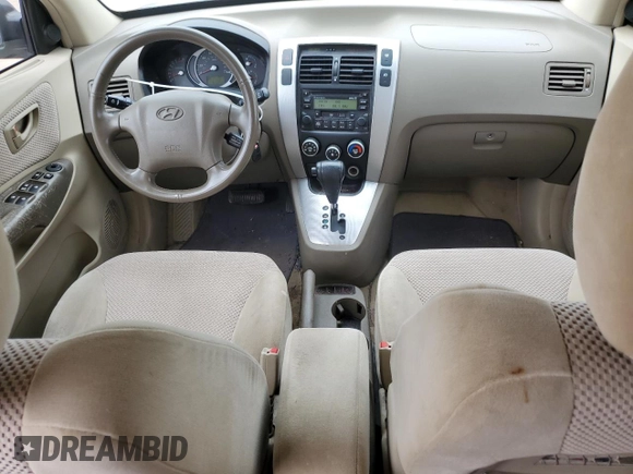 2007 Hyundai Tucson SE with VIN KM8JN12D07U520418, listed as a Copart auction lot 41568235 with 64,256 mi miles and Salvage Title. Bid and sale history available at carsss.com. Image 8.