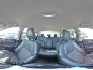 2019 Toyota Corolla L with VIN 5YFBURHE5KP921284, listed as a Copart auction lot 54277235 with 100,935 mi miles and Salvage Title. Bid and sale history available at DreamBid. Image 14.