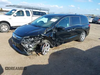 2019 Honda Odyssey EX with VIN 5FNRL6H54KB036540, listed as a IAAI auction lot 42124939 with 135,417 mi miles. Bid and sale history available at carsss.com. Image 18.