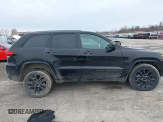 2019 Jeep Grand Cherokee Laredo E with VIN 1C4RJFAGXKC674676, listed as a IAAI auction lot 41942125 with 72,151 mi miles. Bid and sale history available at carsss.com. Image 14.