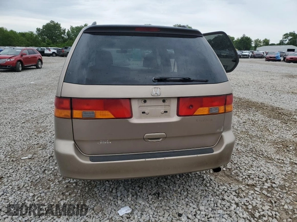 2003 Honda Odyssey EX z VIN 5FNRL186X3B152340, wystawiony jako Copart lot #57883455 z przebiegiem 214 008 mil mil oraz Szkoda całkowita • Salvage title. Historia ofert i sprzedaży dostępna na DreamBid. Obrazek 6.