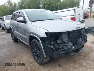 2017 Jeep Grand Cherokee Laredo with VIN 1C4RJEAG0HC702195, listed as a IAAI auction lot 42427597 with 104,403 mi miles and . Bid and sale history available at DreamBid. Image 1.
