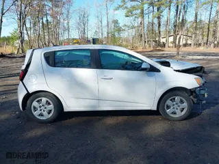 2014 Chevrolet Sonic LS with VIN 1G1JA6SH1E4128568, listed as a IAAI auction lot 41801552 with 151,284 mi miles. Bid and sale history available at carsss.com. Image 13.
