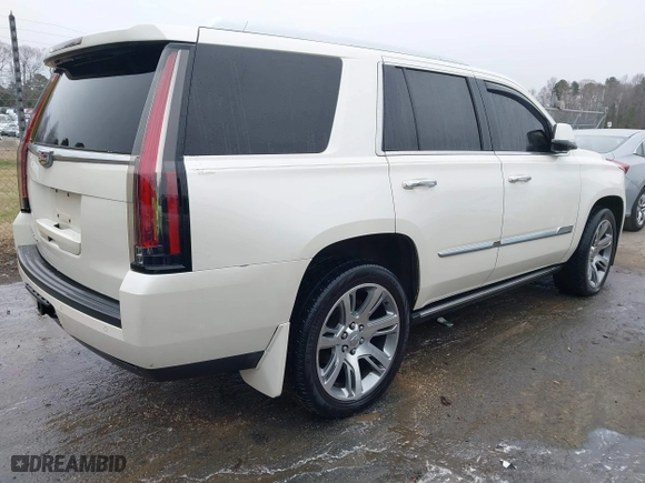 2015 Cadillac Escalade Premium with VIN 1GYS4NKJ9FR547587, listed as a IAAI auction lot 41556378 with 155,038 mi miles. Bid and sale history available at carsss.com. Image 4.
