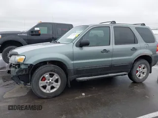 2006 Ford Escape XLT with VIN 1FMYU03126KC55897, listed as a IAAI auction lot 41733243 with 136,989 mi miles. Bid and sale history available at carsss.com. Image 14.
